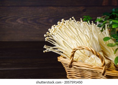 Enoki Mushroom On Wooden Table