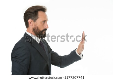 Enough tolerating unacceptable behavior. Hold on. Man shows hand palm gesture to stop isolated on white. Man bearded mature in formal wear. Businessman manager with beard mustache shows stop gesture.