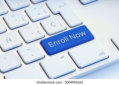 Enroll now phrase on computer Keyboard Key - Shutterstock ID 2004994262