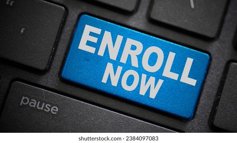 Enroll now text button on computer keyboard