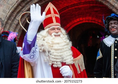 ENSCHEDE, THE NETHERLANDS - NOV 13, 2021: Portrait of the the dutch Santa Claus called 'Sinterklaas' while he is arriving in town.