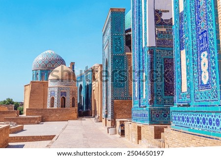 The ensemble of mausoleums Shahi-Zinda. Decorated with turquoise and blue tiles with floral patterns. UNESCO World Heritage Site. Samarkand, Uzbekistan - July 20, 2024