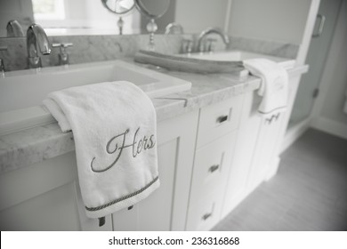 An Ensuite Bathroom / With The His And Hers Towels / They Each Have A Sink