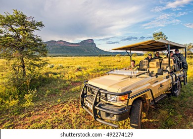 ENTABENI, SOUTH AFRICA, MAR 29: Group Of Safari Tourists In Toyota Truck On Early Morning Drive In Entabeni Game Reserve On March 29, 2015.  Entabeni Is Located 3 Hrs From Johannesburg.