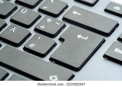 Enter Key On A Simple Generic Grey Office Desktop PC Keyboard, Object Detail, Macro, Extreme Closeup, Nobody, No People. Bright Gray Computer Keyboard Angle Shot, Technology, Office Equipment Concept