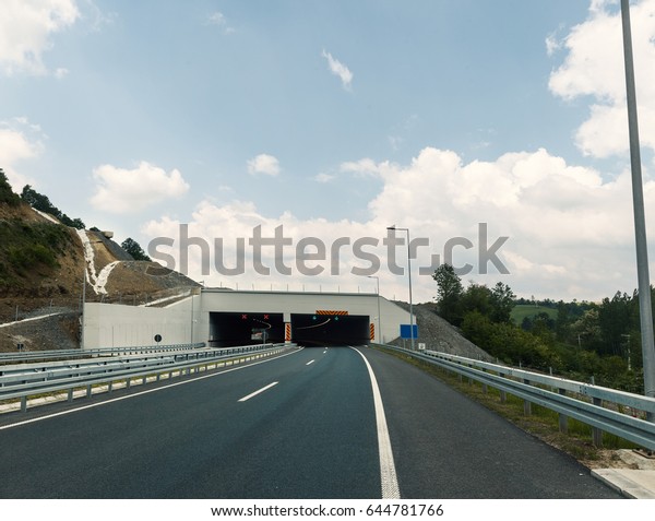 enter the tunnel on the\
highway