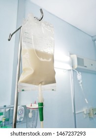 Enteral feeding bag on IV pole in patian room. - Shutterstock ID 1467237293