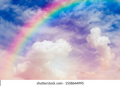 Entering the Heaven, blurred defocused photo of sky and rainbow. Unfocused Heaven gates to Paradise in clouds, God path. Dramatic light. Gateway to the garden of Eden - Shutterstock ID 1558644995