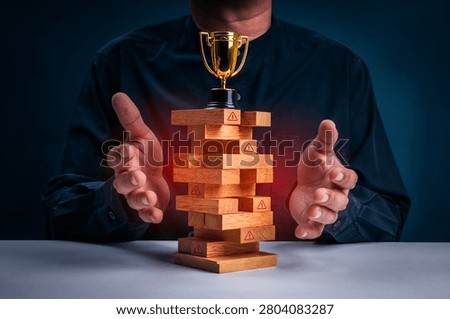 Enterprise risk management concept featuring stability tower with compliance indicators and success trophy. Internal controls, risk monitoring, crisis prevention, governance, and business resilience.
