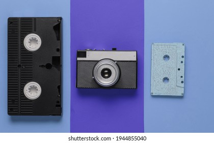 Entertainment And Media 80s. Pop Culture Objects On A Colored Paper Background. Top View. Minimalism