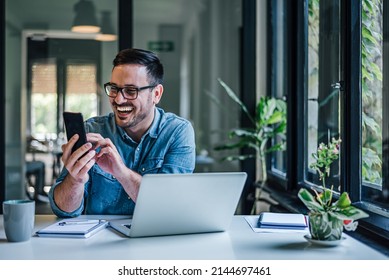 Enthusiastic Adult Man, Getting Good News In The Middle Of Work.