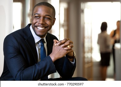 Enthusiastic Chic Handsome Charismatic Classy African American CEO In His Office Smiling Confidently 