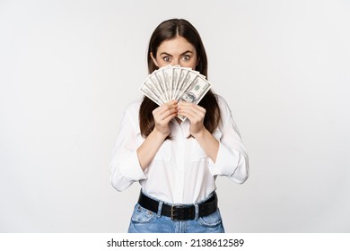 Enthusiastic Woman Showing Money, Cash And Smiling, Got Loan, Micro Credit, Standing Delighted Against White Background