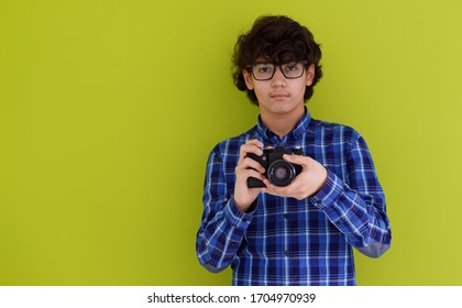 Enthusuast Arab Teen Photographer With Analog Slr Camera On Pink Packground