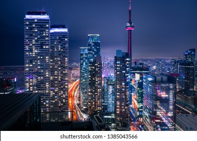 Entire Futuristic City Skyline View Of Downtown Toronto Canada. Modern Buildings, Urban Architecture, Cars Travelling. Construction And Development In A Busy City.