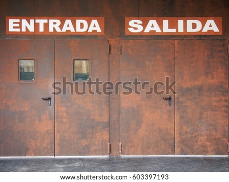Entrada y Salida, Entrance and Exit Doors to a Night Club in a Backstreet of Cartagena, Murcia Region, Spain