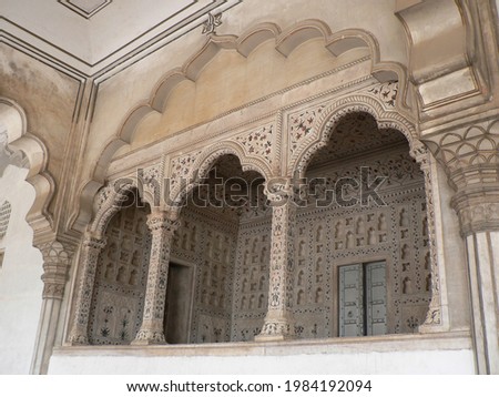 The entrance to Agra Fort in Agra, India with intricate stonework and decorations