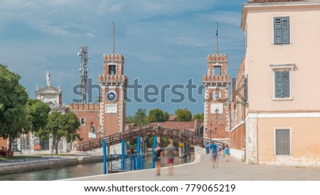 Entrance to the Arsenale timelapse, Venice, Veneto, Itlay and the Campo de l'Arsenale with the canal and Ponte de l'Arsenal o del Paradiso on a sunny day with few tourists