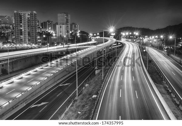 Entrance to Barcelona night on the bridge over the\
motorway Meridiana\
Town