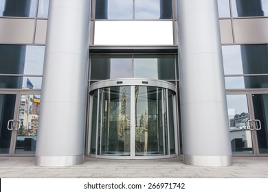 Entrance To The Beautiful Modern Business Office Building With Glasses Automatic Doors. Concept: Money, Power, Shake Hands, Lifestyle.