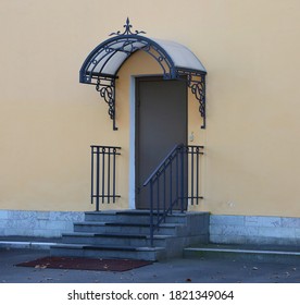 Entrance To The Building With A Canopy Over The Porch