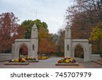 The entrance to the campus at Indiana University in Bloomington, Indiana is colorful, with a variety of chrysanthemums and the harvest colors of Autumn trees.