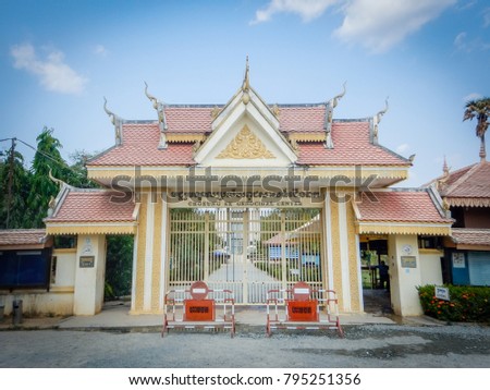 The entrance of the Choeung Ek Genocidal Center in Cambodia where roughly 17,000 men, women, and children were murdered by soldiers of The Communist Party of Kampuchea, also known as the Khmer Rouge