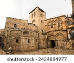 entrance to the Church of the Holy Sepulcher (Latin: Ecclesia Sancti Sepulchri) on a rainy day