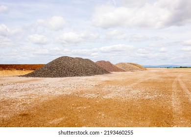 entrance construction site, driveway of building site. Pile of sand and Gravel for construction. limestone materials for construction industry. - Shutterstock ID 2193460255