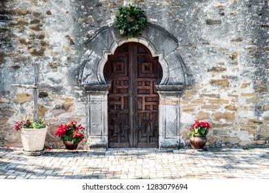 Entrance Door To Mission Espada In San Antonio Texas On A Bright Sunny Day With Christmas Decorations - Wooden Rustic Door