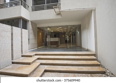 Entrance Door And Steps To A Modern Luxury Apartment Building