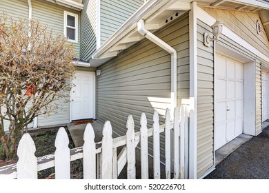 Entrance Of Duplex Home With Picket Fence. Northwest, USA