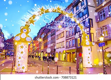 Entrance Gate With Illumination Decorations To The Christmas Market In Strasbourg - Capital Of Noel, Alsace, France.