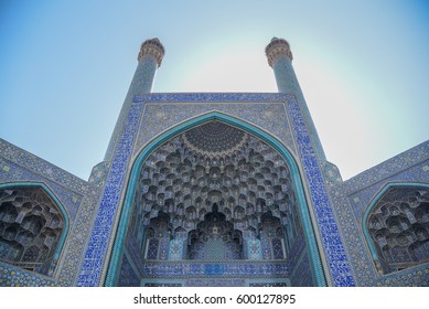 Entrance gate with ornate blue mosiac pattern of Shah Mosque (Imam mosque), situated on the south side of Naqsh-e Jahan Square square, one of UNESCO World heritage sites in Isfahan (Esfahan), Iran