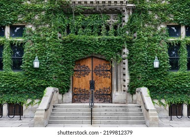 Entrance To Gothic Style Old Stone College Building Covered In Ivy