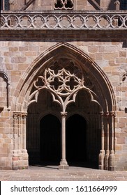 Entrance With Gothic Tracery And Wooden Door At The Cathedral Of Tréguier In Bretagne, France