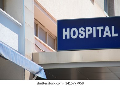 
Entrance Of A Hospital With A Hospital Sign