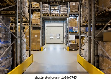 Entrance To A Huge Warehouse With Metal Rack