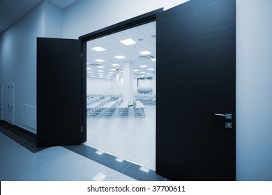 Entrance Into A Large And A White Auditorium