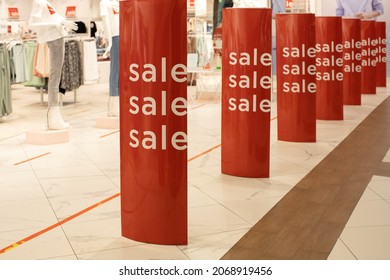 Entrance lobby to store, decorated for seasons of discounts, with inscription Sales. Fashion concept, discount season, black friday, offline shopping, gimmicks, holiday sales. - Shutterstock ID 2068919456