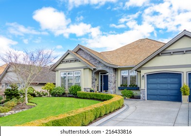 Entrance Of A Luxury House With Beautiful Landscaping On A Bright, Sunny Day. Home Exterior Design.