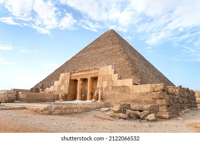 The entrance of the mastaba of Seshemnufer IV late 5th Dynasty and the Great Pyramid in background. The Pyramid Fields from Giza to Dahshur is on UNESCO World Heritage List