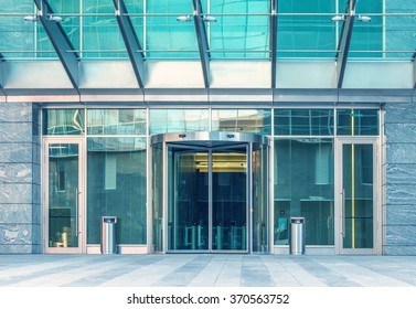 Entrance of the modern business city office building. - Shutterstock ID 370563752