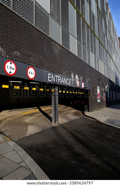 Entrance to
a multi-storey car park with warning
signs