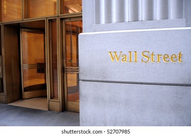 An entrance to an office building on Wall Street in New York City