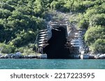 The entrance an old abandoned Yugoslavian submarine base in the bay of Kotor in Montenegro