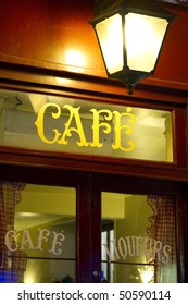 Entrance Of A Paris Cafe At Night