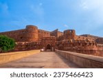 The entrance to the Red Fort, one of the tourist attractions in India. Agra Fort is a historic red sandstone fort and a UNESCO World Heritage Site.