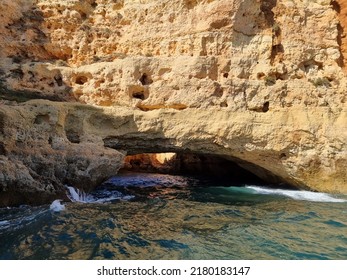 Entrance Of A Sea Cave Under A Cliff.