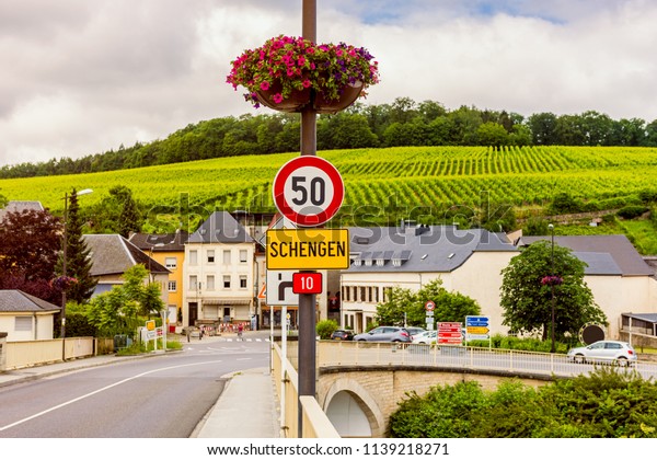 Entrance Sign to\
Schengen, Luxembourg. Schengen is best known for The Schengen\
Agreement, signed in 1985.\
